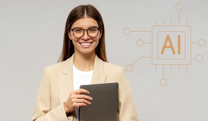 Portrait of university female student or teacher holding laptop, isolated on gray background